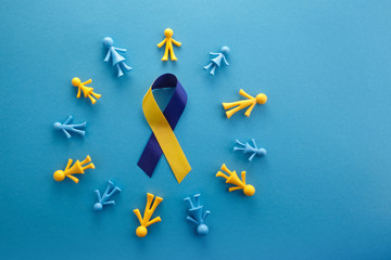 World Down syndrome day on blue background. Down syndrome awareness concept. Top view