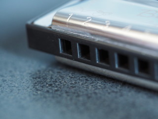 Closeup of C Harmonica with Bokeh