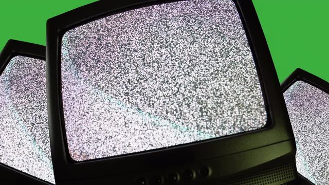 Old retro TV green screen switching on and off, noise static. 70s style television showing firstly green screen and then noise interference. Old vintage TV, flicking noise on screen