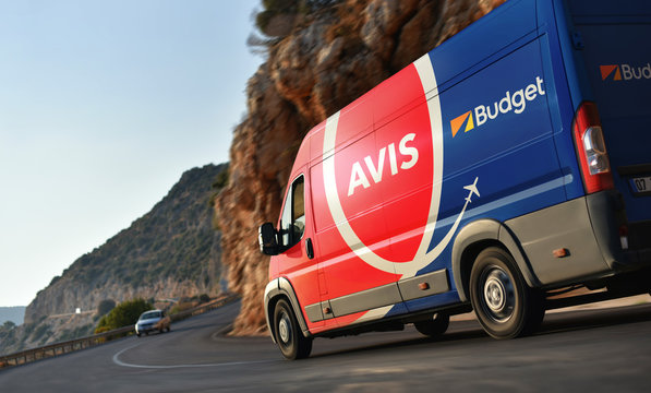 Kas / Turkey - 10.08.18: Van of Avis and Budget - rental car service which speeding by countryside