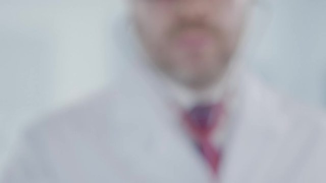 Physician holds stethoscope bell with the Chinese flag. Healthcare in China