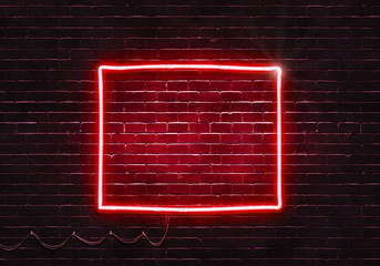 Neon sign on a brick wall in the shape of Wyoming.(illustration series)