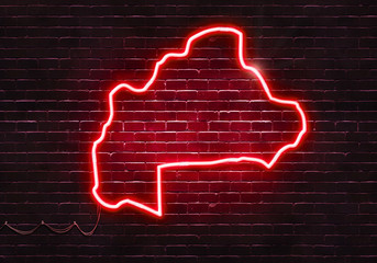 Neon sign on a brick wall in the shape of Burkina Faso.(illustration series)