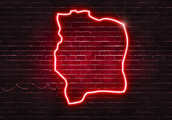 Neon sign on a brick wall in the shape of Ivory Coast.(illustration series)