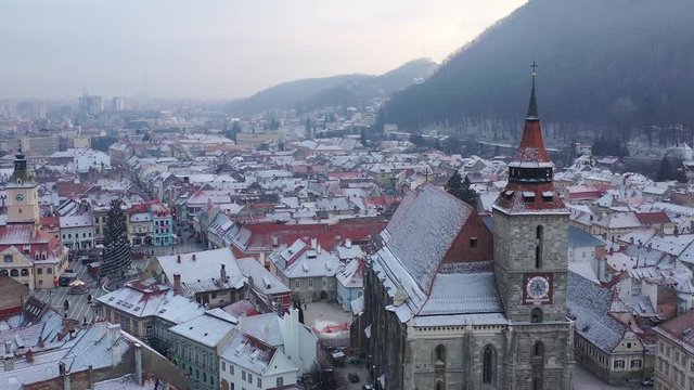 Aerial drone view 4k video. Council Square in Brasov city, Piata sfatului, Romania