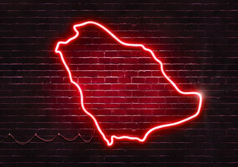 Neon sign on a brick wall in the shape of Saudi Arabia.(illustration series)