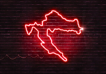 Neon sign on a brick wall in the shape of Croatia.(illustration series)