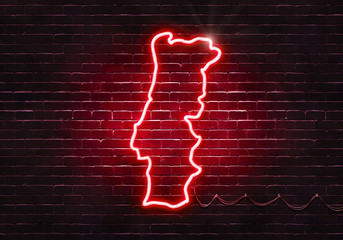Neon sign on a brick wall in the shape of Portugal.(illustration series)