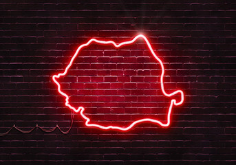 Neon sign on a brick wall in the shape of Romania.(illustration series)