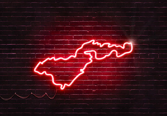 Neon sign on a brick wall in the shape of American Samoa.(illustration series)