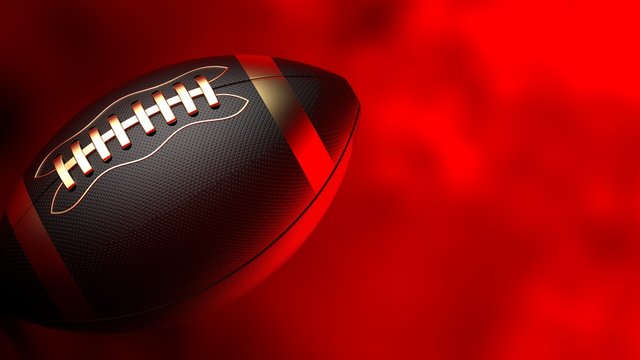 Black-Gold American football standard ball under red background. 3D illustration. 3D high quality rendering.