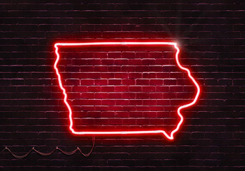 Neon sign on a brick wall in the shape of Iowa.(illustration series)