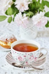 A tea party  in the style of Shabby Chic. tea in the beautiful tea steam with a pattern 
