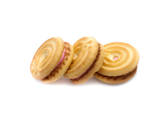 Obraz na płótnie Canvas sandwich cookies with strawberry cream on white background