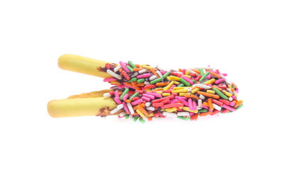 Biscuit stick bread with sweet colorful chocolate isolated on white background