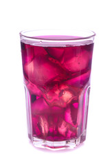 Glass of red grape juice with fruit isolated on white