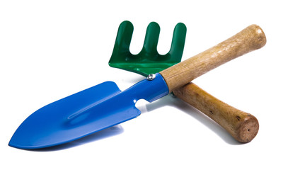 Garden tools shovel and fork isolated on white background