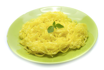 yellow noodles on dish isolated on white background