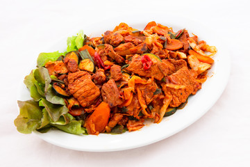 Stir fried with pork and vegetables sprinkle sesame seeds