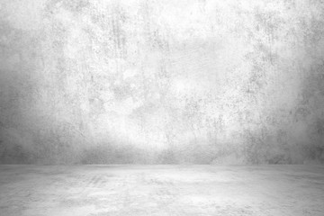 Empty room with white wall and concrete floor