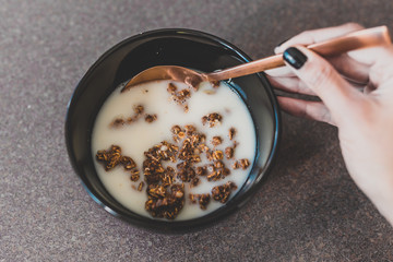 plant-based breakfast ideas, dark chocolate coated granola with oat milk