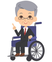車いすに乗って指示を出す会社員