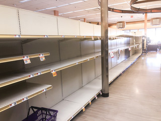 Boston,MA/ USA - March 16, 2020: Empty grocery store shelves because of the panic and overpurchase due to Novel Coronavirus COVID 19 fears