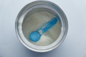 Close up of baby milk powder in a container 