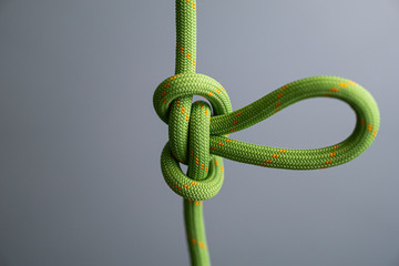 butterfly knot green climbing rope isolated