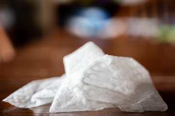crumpled sanitizing wipe used to disinfect