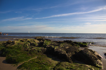 rocks and sailboat