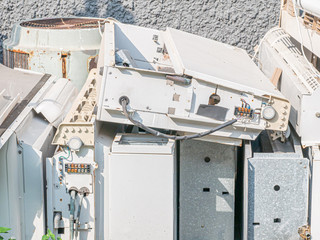 Electronic wastes or E-wastes of old air conditioners.