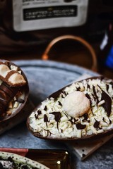 Delicious chocolate Easter eggs on gray background