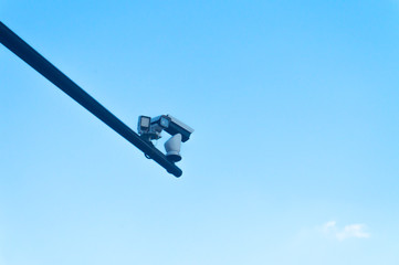 Multiple CCTV Camera with blue sky in the background in daytime