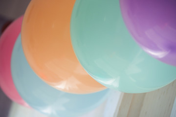colorful pastel balloon hanging decoration in birthday celebration party background