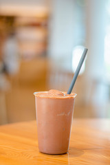 chocolate smoothies milkshake on wood background