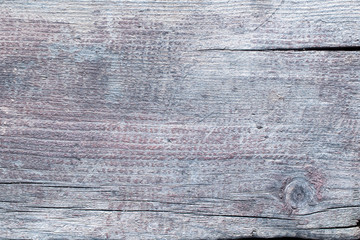 Off-white, weathered wood texture, macro shot. Horizontal lines and minor cracks on wood surface. Wooden background.