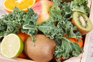 Fresh ripe fruits with vegetables. Healthy dessert containing vitamins and minerals