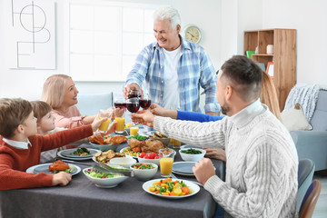 Family celebrating Thanksgiving Day at home