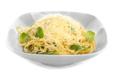 Plate with tasty pasta and cheese on white background
