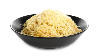 Plate with tasty pasta and cheese on white background