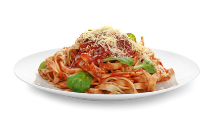 Plate with tasty pasta and cheese on white background