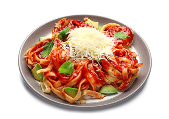 Plate with tasty pasta and cheese on white background