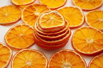 sliced and dried orange on a white background