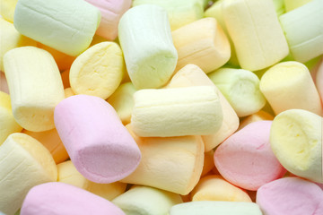 Small multi-colored marshmallows close-up.