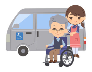 車椅子に乗った老人と介護士　車