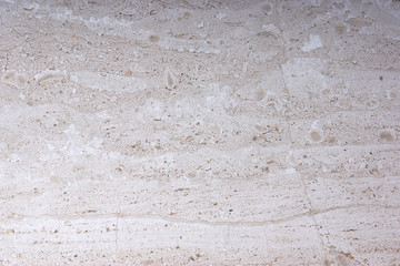 Obraz premium A beige stone with a beautiful pattern for interior work is called Breccia Sarda marble