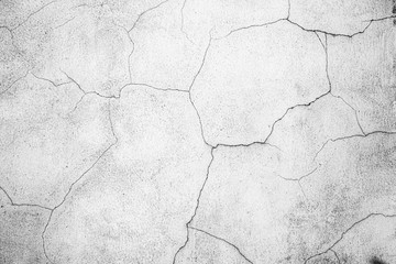 old aged weathered rough dirty concrete crack wall texture. black and white surface with grunge dust noise grain effect abstract for background.