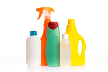 Cleaning product plastic multi-colored container for house clean on white table and isolated. household chemicals