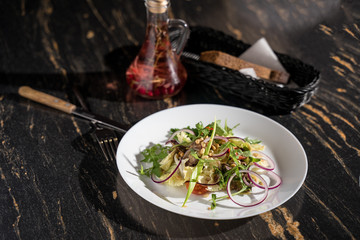 Siberian salad with herbs and pine nuts